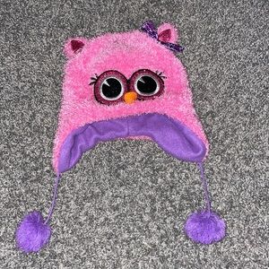 This is a pink hat for the cold, can fit a 10-14 year old